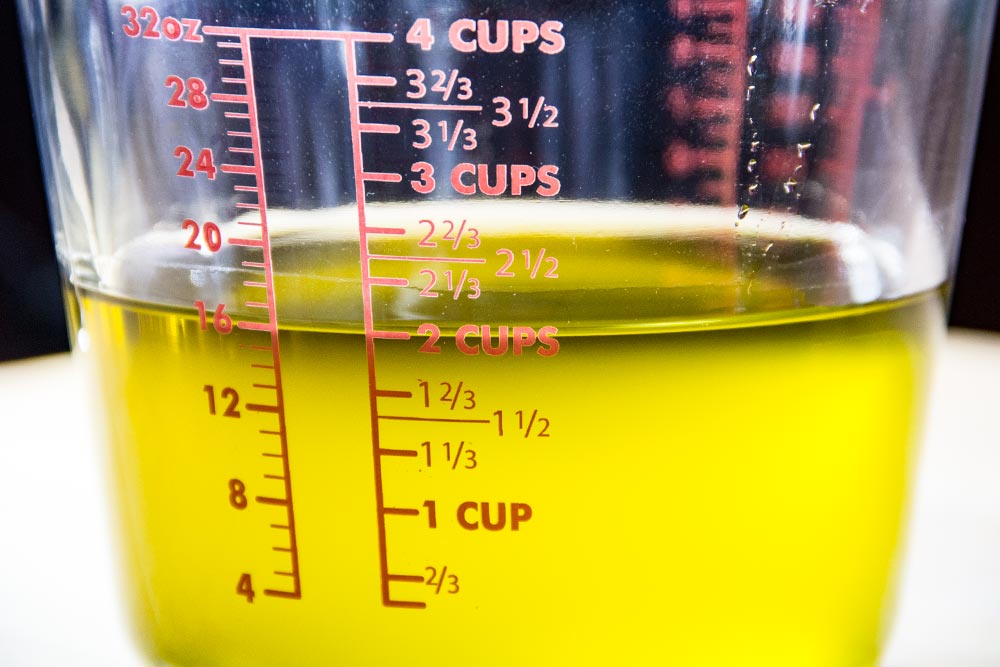 Extra-Virgin Olive Oil in Measuring Cup