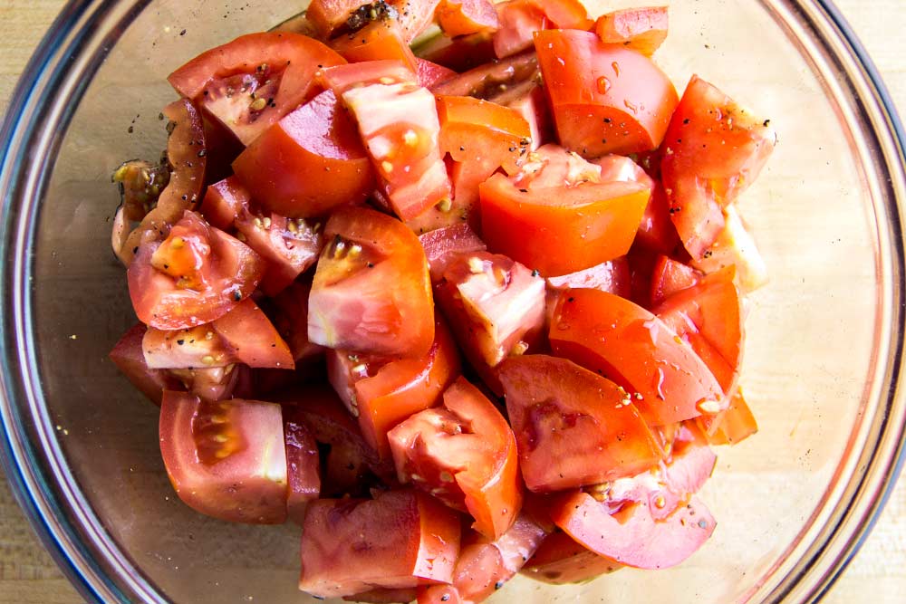 Diced Tomatoes Marinading in Glass Bowl