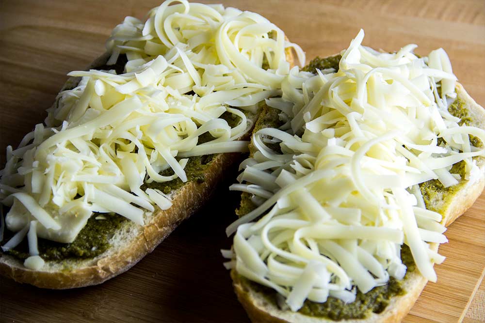 Shredded Swiss Cheese & Brie Cheese Slices on Italian Bread