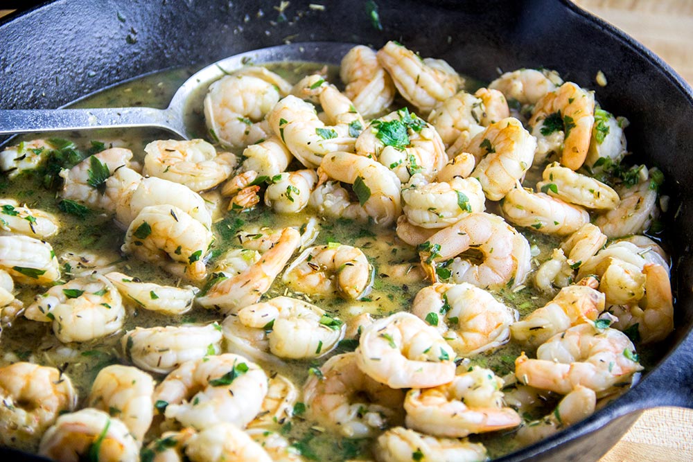Cooked Shrimp, Beer, Herbs & Spices in Skillet