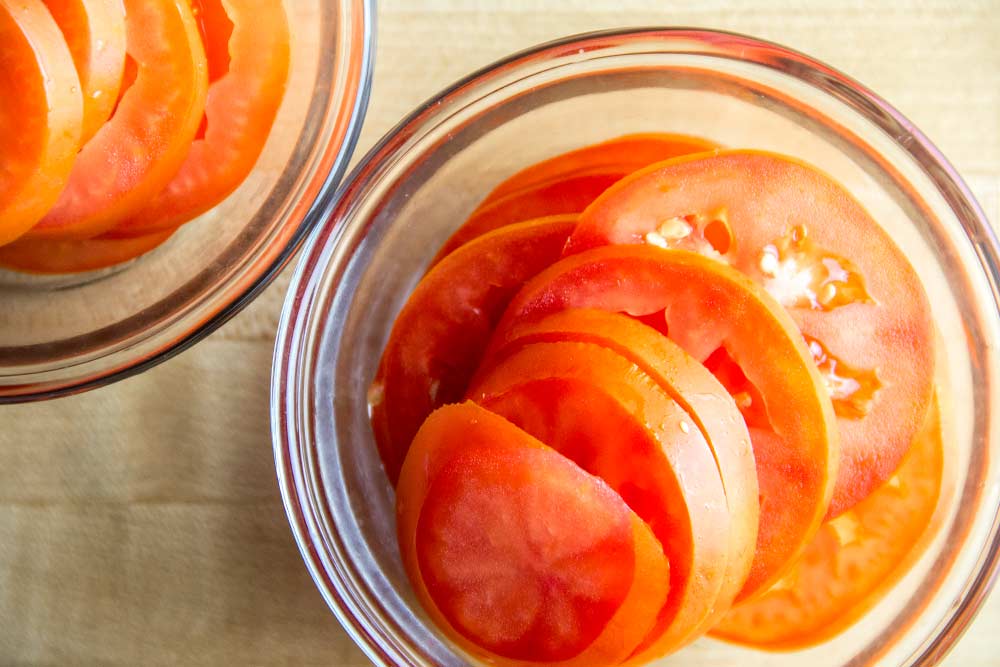 Sliced Plum Tomatoes in Glass Bowls