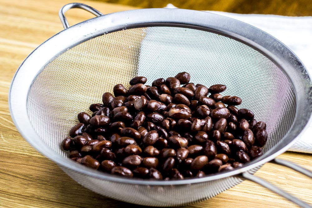 Rinsed Canned Black Beans in Strainer