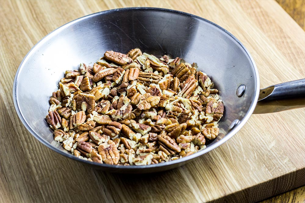 Toasting Chopped Pecans in Small Stainless Steel Skillet