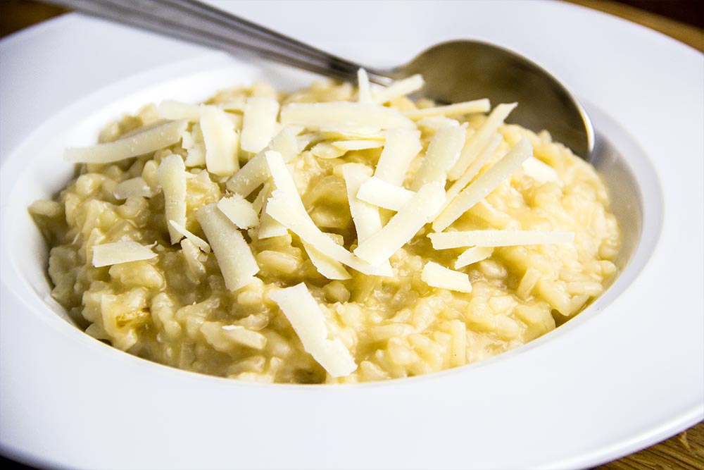 Shredded Parmesan Cheese on Creamy Risotto