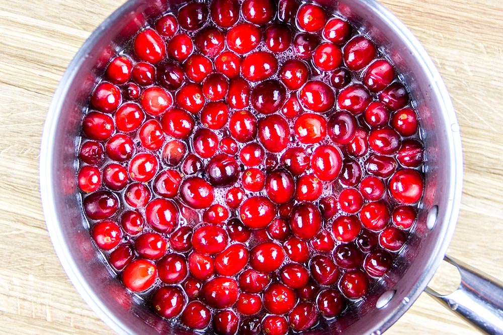 Cranberries, Butter & Maple Syrup in Saucepan
