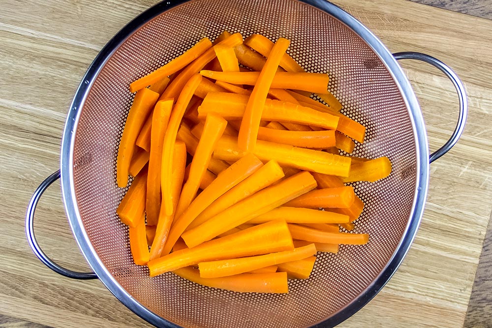 Cooked Carrots in Colander