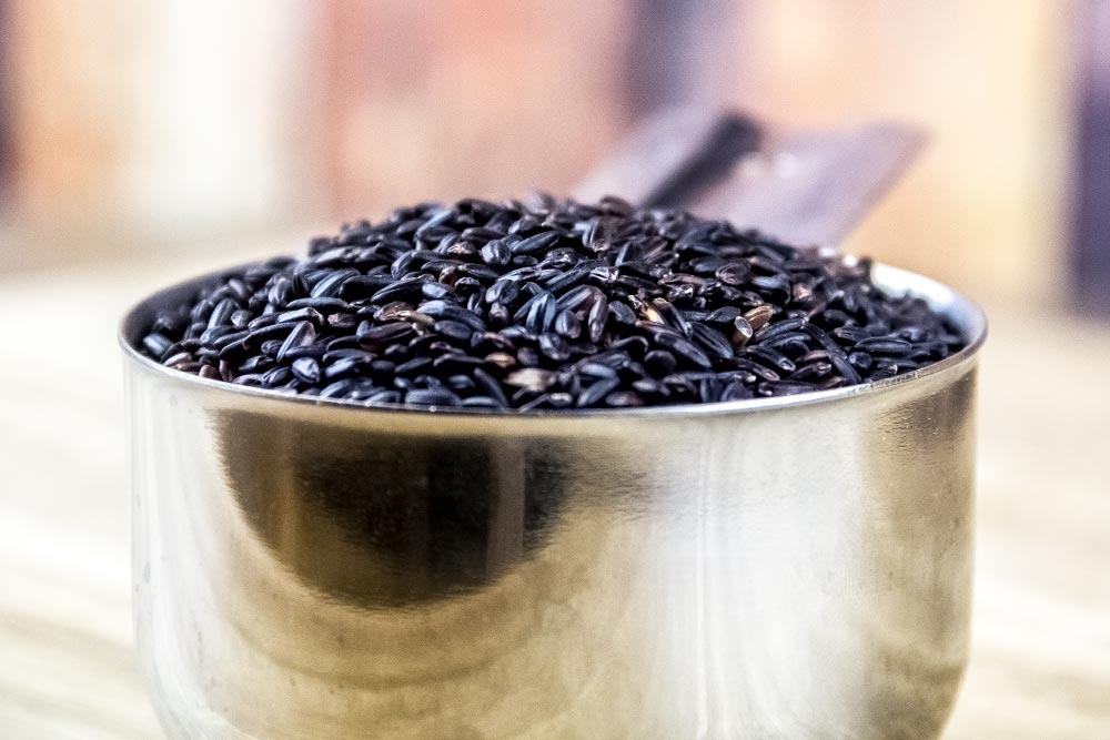 Dry Black Rice in Measuring Cup