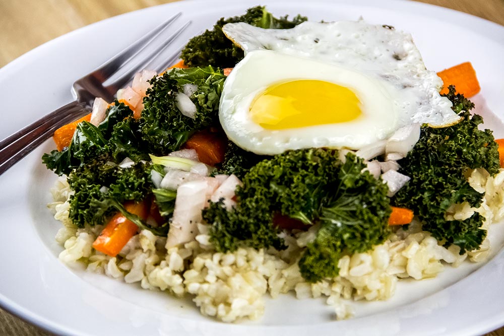Brown Rice Bowls with Roasted Carrots, Kale & Fried Eggs Recipe