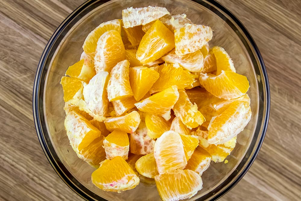 Pieces of Oranges in Glass Bowl
