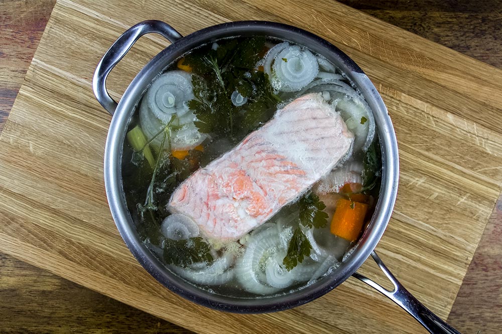 Poached Salmon in Frying Pan Skillet