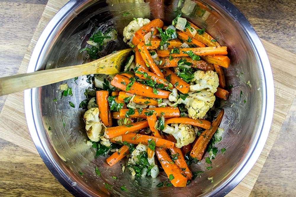 Tossed Roasted Carrots and Cauliflower in Large Bowl