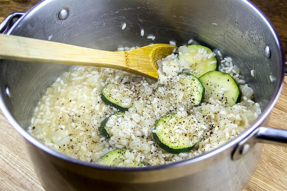 Adding Salt and Pepper to Risotto