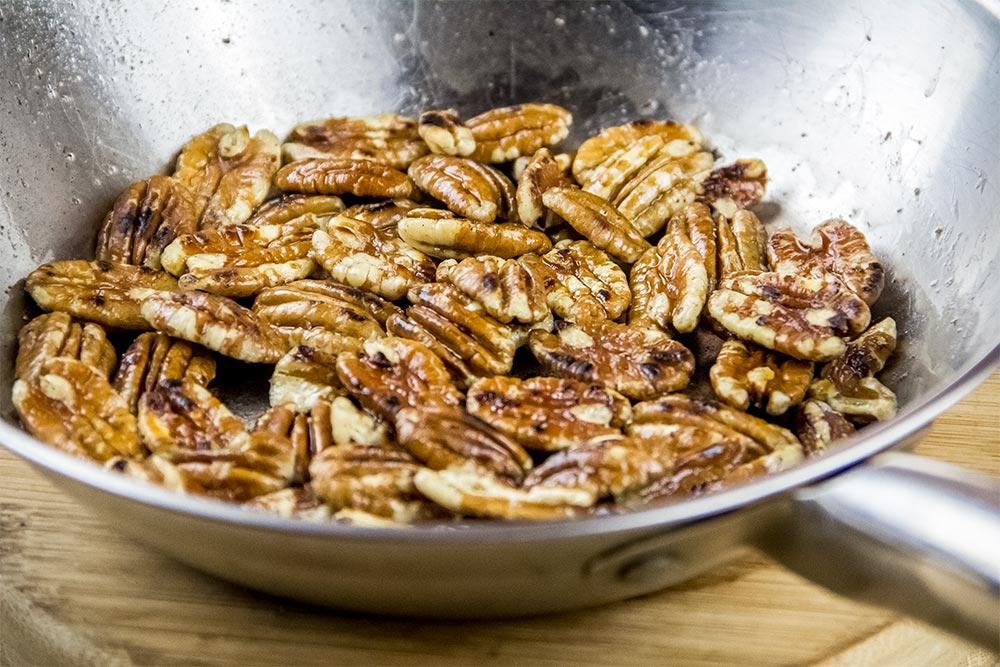 Toasted Pecans with Olive Oil, Salt and Pepper in Small Skillet