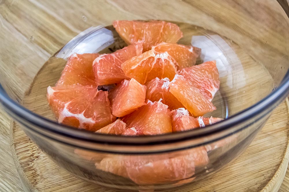 Pieces of Pink Grapefruit in Bowl