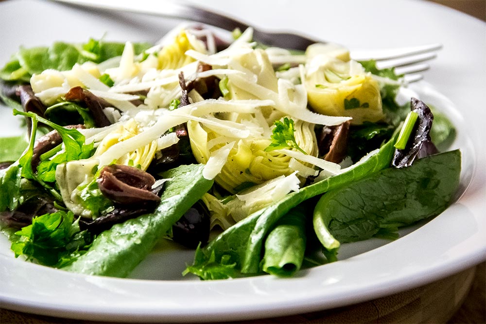 Baby Greens with Artichokes, Olives & Asiago Cheese Recipe