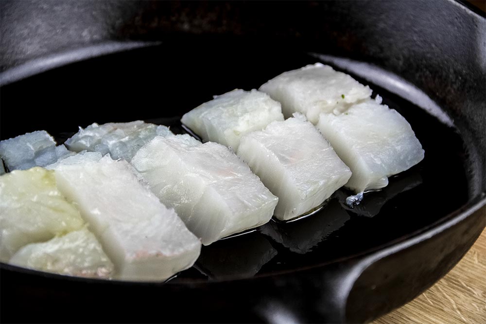 Pieces of Cod in Skillet