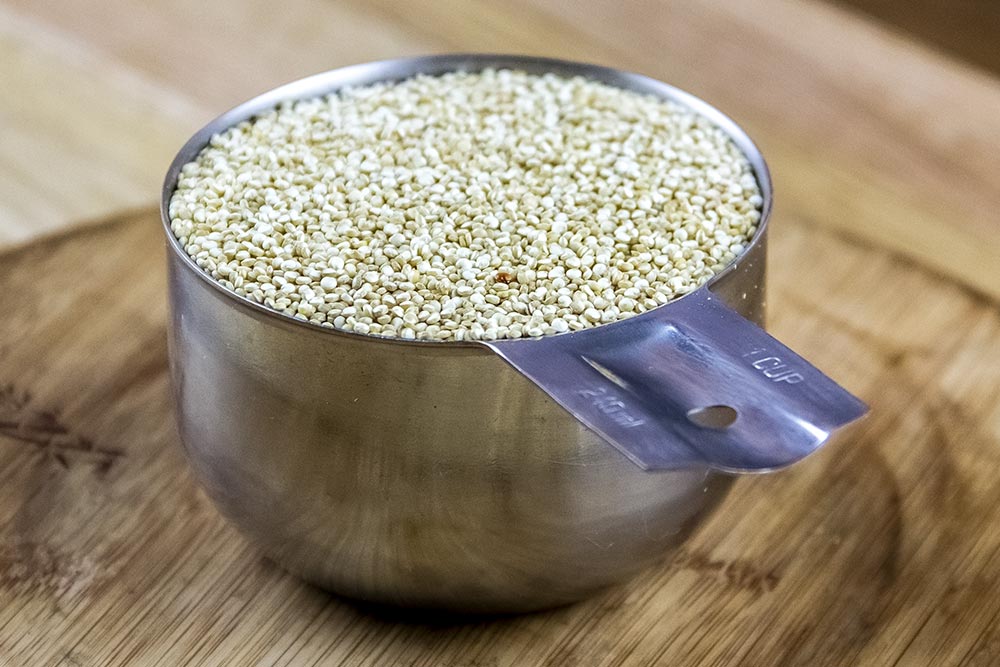Raw Quinoa in Measuring Cup