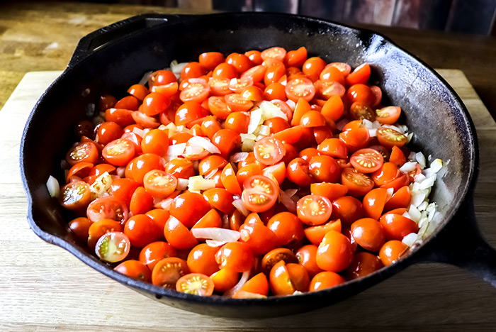Uncooked Cherry Tomatoes in Skillet